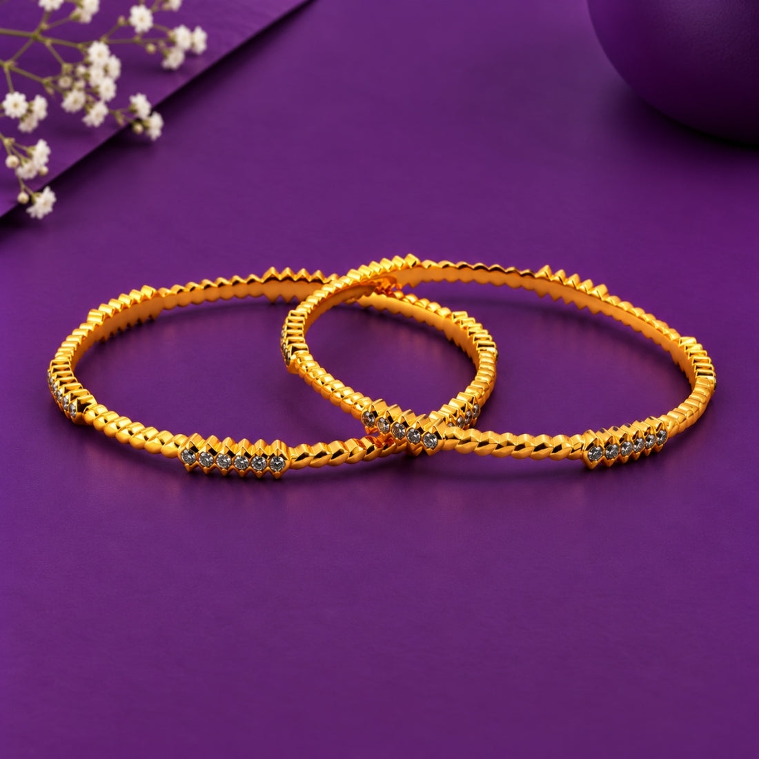 The Heritage Twirl Textured Stackable Bangles (Set of 2 in 925 Sterling Silver with Rich Gold Polish)